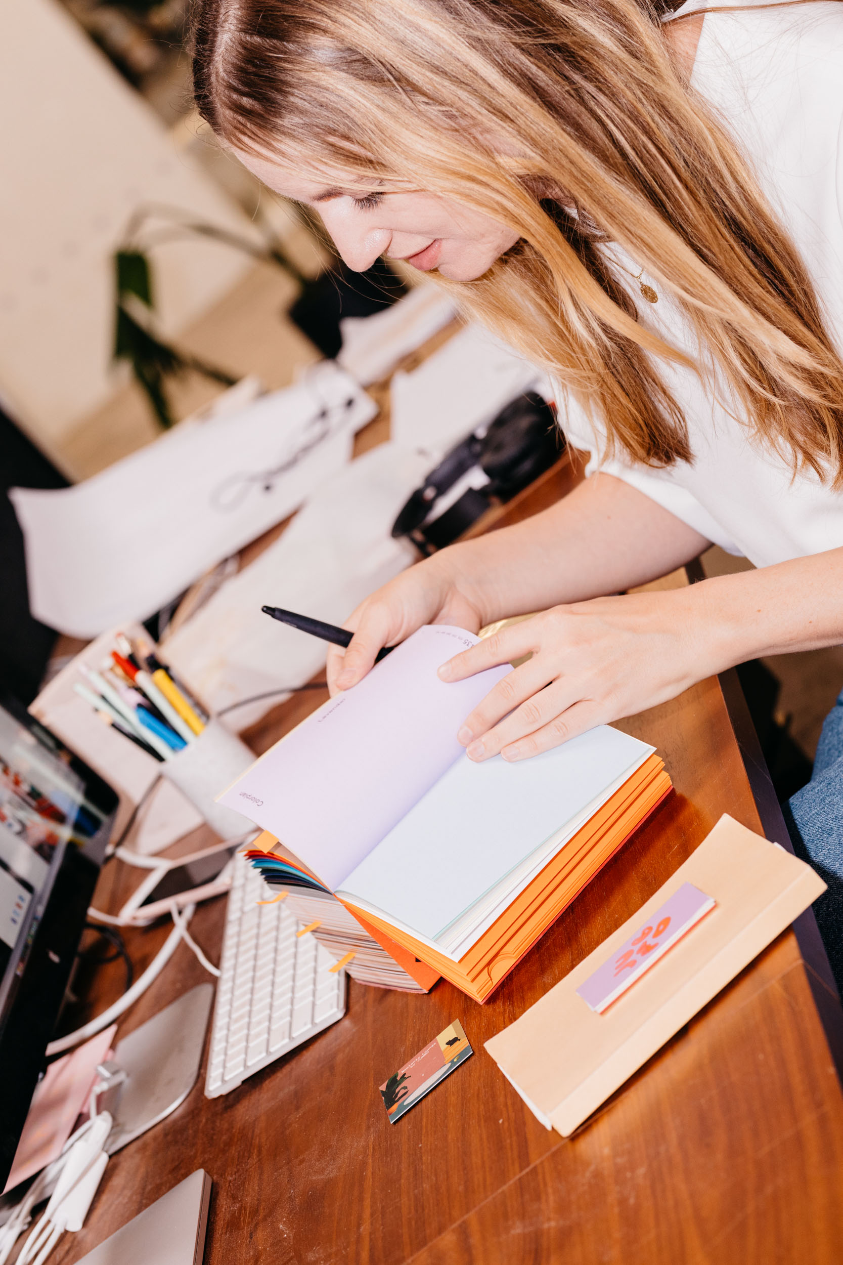 Verena at her workstation, not to miss the little notebooks!